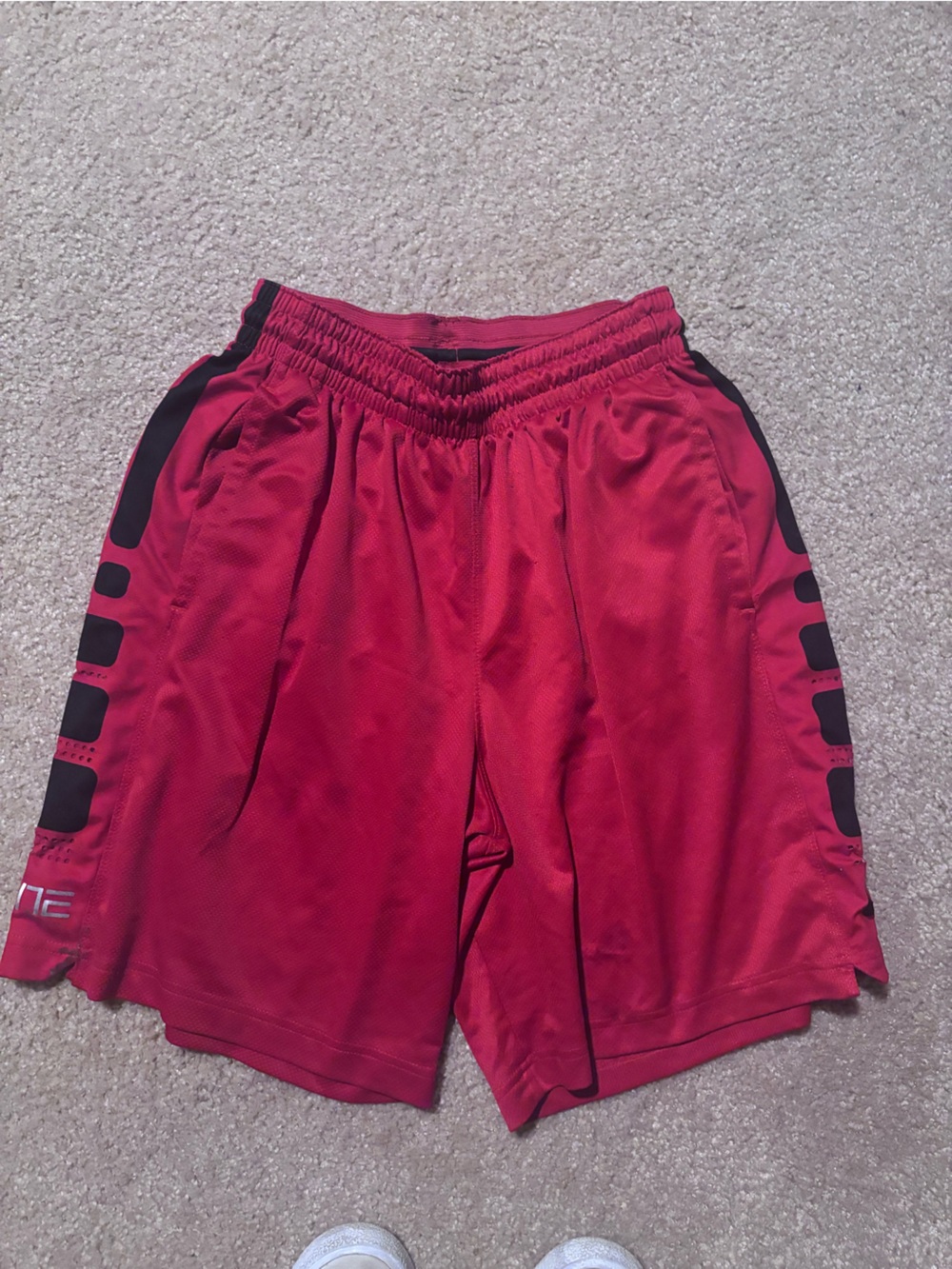 Nike Red Athletic Shorts with Black Side Accents